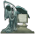 A gravestone with a statue of the Grim Reaper next to it.